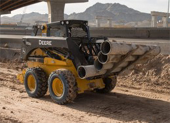 Large-frame skid steer equipped with forks