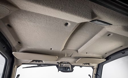 Headliner, sun visors, rearview mirror, and dome light