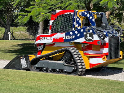 John Deere 325G Skid Steer Wrapped in American Flag