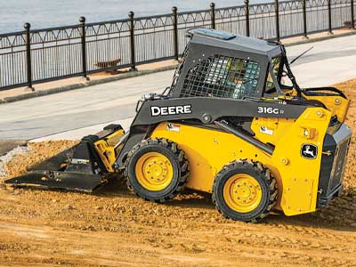 Leveling and grading attachment for Skid Steer