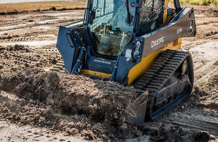 325G removing material from a jobsite