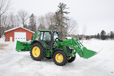 600R Loader working with a 5100R Tractor