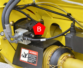 Optional dual-header drive (B) drives the pickup reel