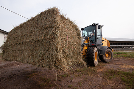 324L Moving Hay Bales