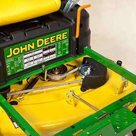 Footrest opens for access to mower deck