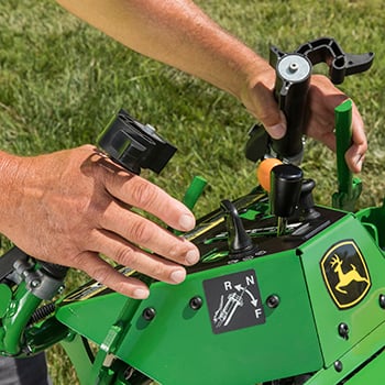 Steering levers control speed and direction in use