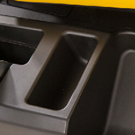 Open storage on left side of vehicle