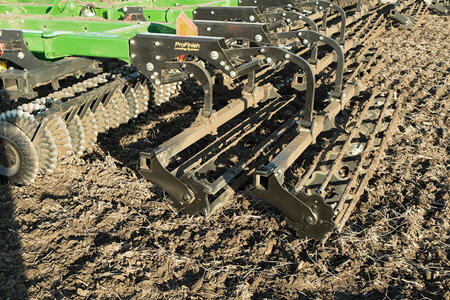 Distribute soil during spring tillage