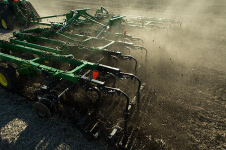 Rolling baskets distribute residue and reduce clods