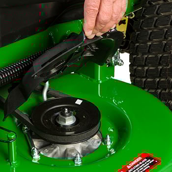 Flip-up spindle cover