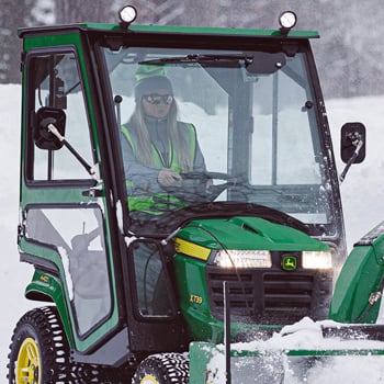 Hard-side cab with optional outside mirrors and work lights