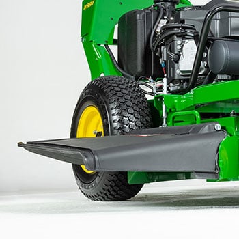 Flexible mower-discharge deflector