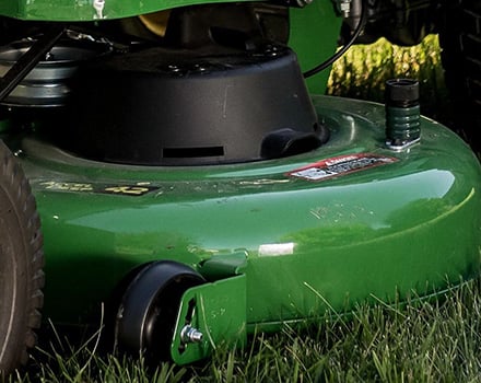 Hinged spindle pocket cover on the 42A Mower Deck