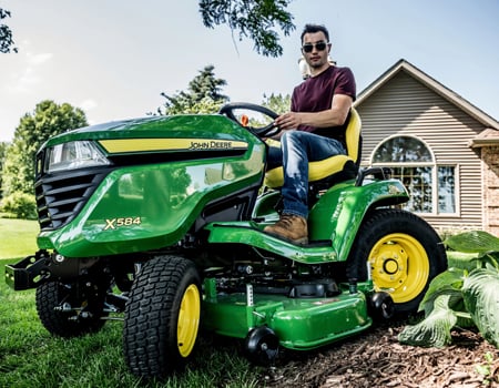 Four-wheel steer trimming (shown on similar X584 Tractor)