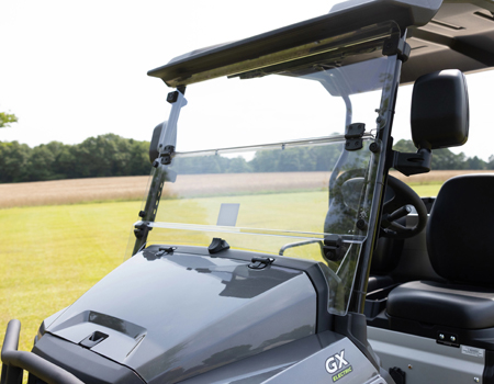 Hinged windshield in raised position