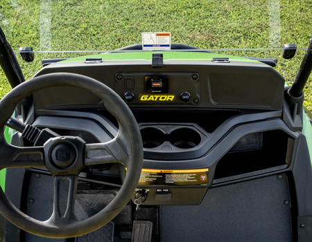 Dash-mounted controls, battery-level indicator, and USB power ports