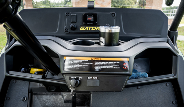 Dash storage compartments, cup holders, and USB power ports