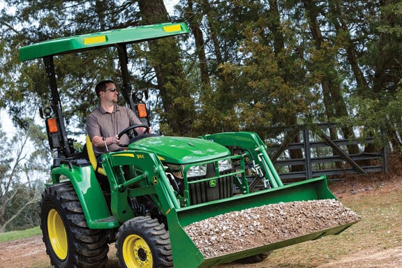 Pre-Owned John Deere 3025E Compact Tractor with 300E Loader in Homestead, FL Photo 3