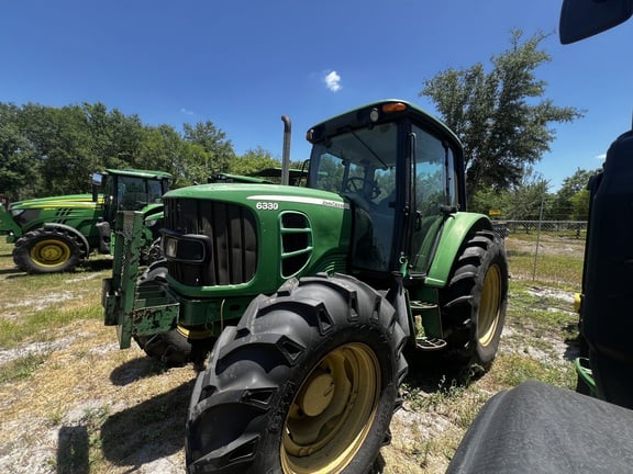 Pre-Owned John Deere 6330 in Plant City, FL Photo 0